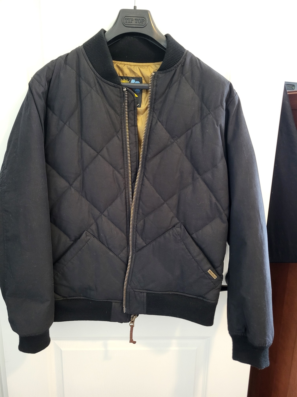 Eddie Bauer Black Quilted Bomber Jacket with Tan Lining